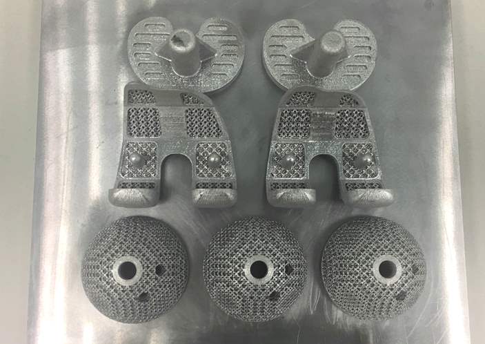 3D-printed acetabular cups and knee joint.