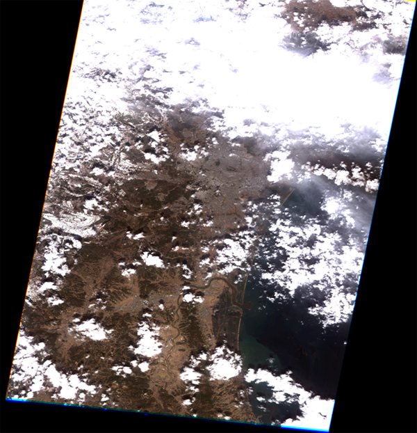 FORMOSAT-2 image of extremely destructive tsunami waves that had traveled up to 6 km inland in the Sendai coast on March 12, 2011.